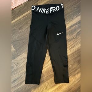 Black half length Nike leggings, great for running and lifting!